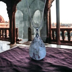 Elbaite stone pendant with sterling chain.